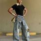 👖⭐ PROMO FLASH 50% ! Jean Unisexe Baggy avec Patchs Étoiles – Coupe Oversize, Tissu Polyester Durable, Ceinture Liée, 6 Tailles, Style Années 90 & Streetwear ✨