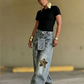 👖⭐ PROMO FLASH 50% ! Jean Unisexe Baggy avec Patchs Étoiles – Coupe Oversize, Tissu Polyester Durable, Ceinture Liée, 6 Tailles, Style Années 90 & Streetwear ✨