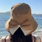👒🌞 PROMO FLASH 50% ! Chapeau de Soleil Femme à Bords Extra Larges avec Nœud – Tissu Respirant, Flexible, 3 Couleurs, Couverture 360°, Parfait pour Plage, Voyage & Vacances 🌴