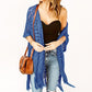 🌿✨ PROMO FLASH 50% ! Pareo/Poncho en Maille Ajourée pour Femme – Ouverture Avant, Pompons Bohème, Léger, Parfait pour la Plage, les Vacances ou le Quotidien 🏖️