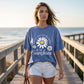 🌼 50% DE RÉDUCTION ! 👕 T-Shirt Unisexe Imprimé Marguerite Vintage Wash – Coupe Ample, Tissu Doux & Silhouette Décontractée – Parfait pour l’Été et le Quotidien ✨💛