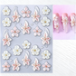 💅 -50% ! 🌸 Autocollants à Ongles Floraux 5D – Motifs Lys & Marguerites – Relief Gaufré & Palette Printanière pour Manucure Facile et Élégante ✨